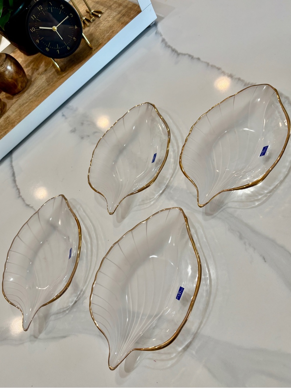 Studio Nova Leaf serving dishes made of frosted and clear glass with gold rim